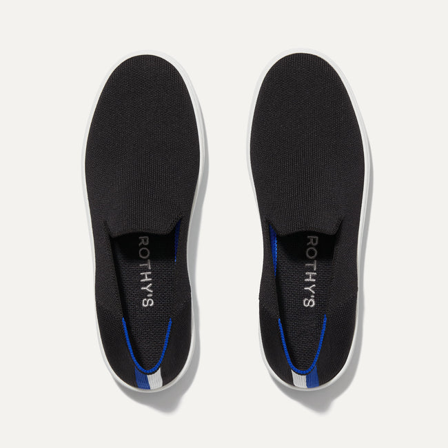 A pair of The slip-on Sneaker in Black Solid shown from the top view.