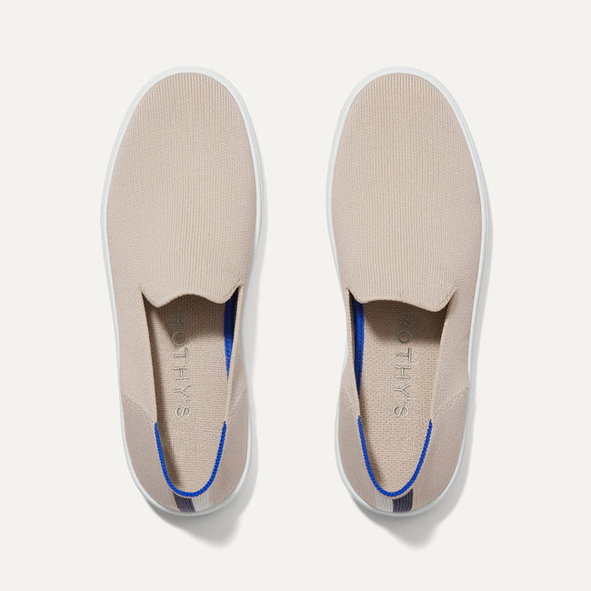 A pair of The slip-on Sneaker in Sand shown from the top view.