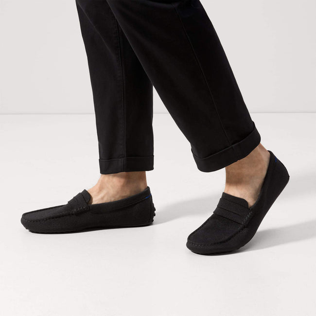 Model wearing The Driving Loafer in Black. 