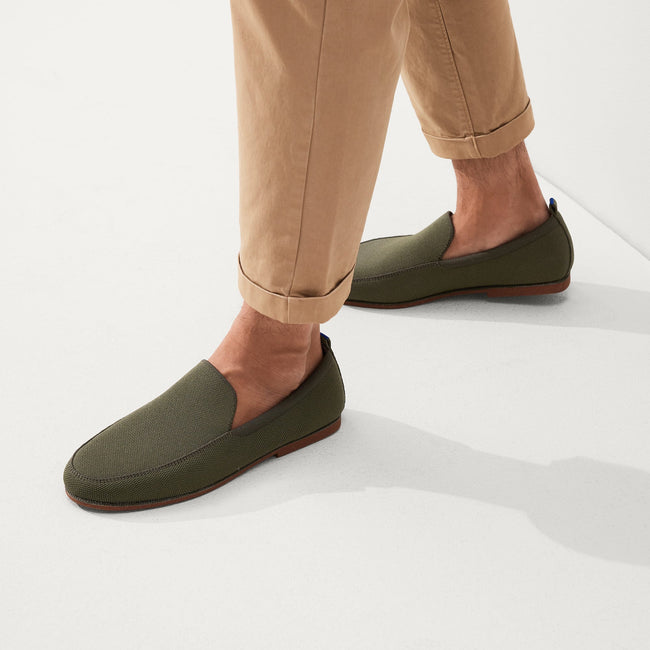 Model wearing The Ravello Loafer in Deep Olive. 