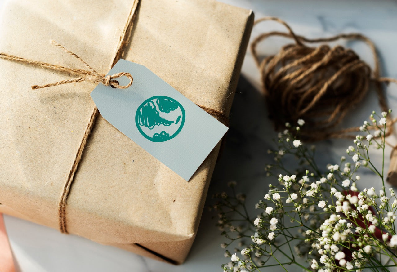 Wrapped gift with earth tag