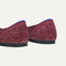 Close up of the heel of The Flat in Crimson Tweed, with Rothy's signature blue halo. 