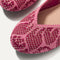 Close up of the rounded toe and v-shaped vamp of The Flat in Pink Bouquet. 