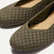 Close up of the rounded toe and v-shaped vamp of The Flat in Safari Basketweave. 