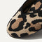 Close up of the rounded toe and v-shaped vamp of The Flat in Desert Cat.