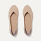 A pair of The Flat round toe shoes in Ecru shown from the top view.