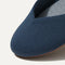 Close up of the rounded toe and v-shaped vamp of The Flat in Navy.