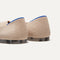 The Point shoe in Ecru shown from the back view with the heel detail.