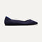 The Point shoe in Maritime Navy shown from a side view showing the outsole.