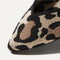 Close up of the pointed toe and v-shaped vamp of The Point in Desert Cat.