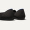 The Loafer in Black Solid shown from the back view with the heel detail.