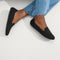hover | The Loafer in Black Solid shown on-model at an angle.
