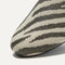 Close up of the toe and vamp of The Loafer in Shimmer Zebra. 