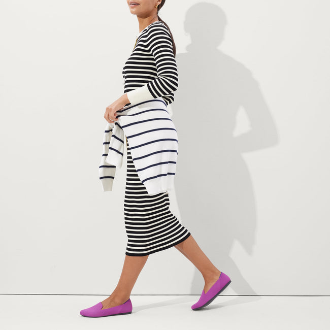Alternate view of a model wearing The Loafer in Wild Orchid. 