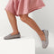 hover | The Kids slip-on Loafer in Taupe Heather shown on-model at an angle.