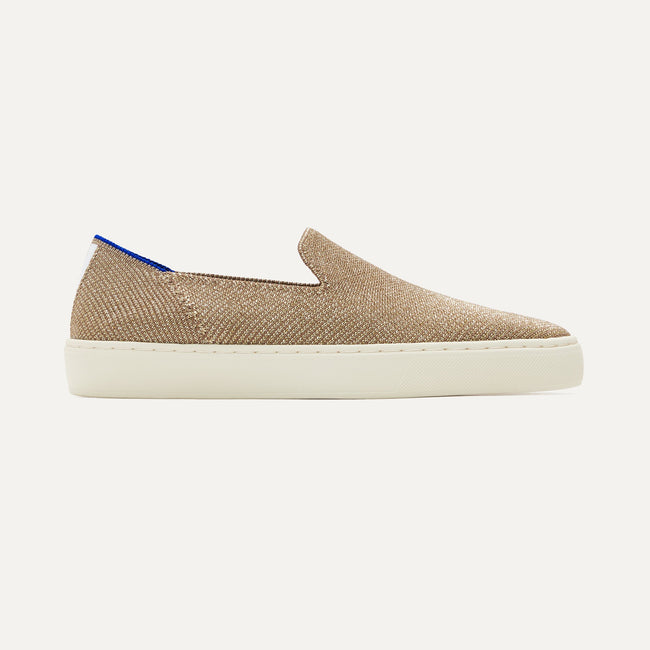 The Original Slip On Sneaker in Gold Twill shown from the side.