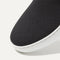 The slip-on Sneaker in Black Solid shown from the top view with detailing of the front of the shoe.