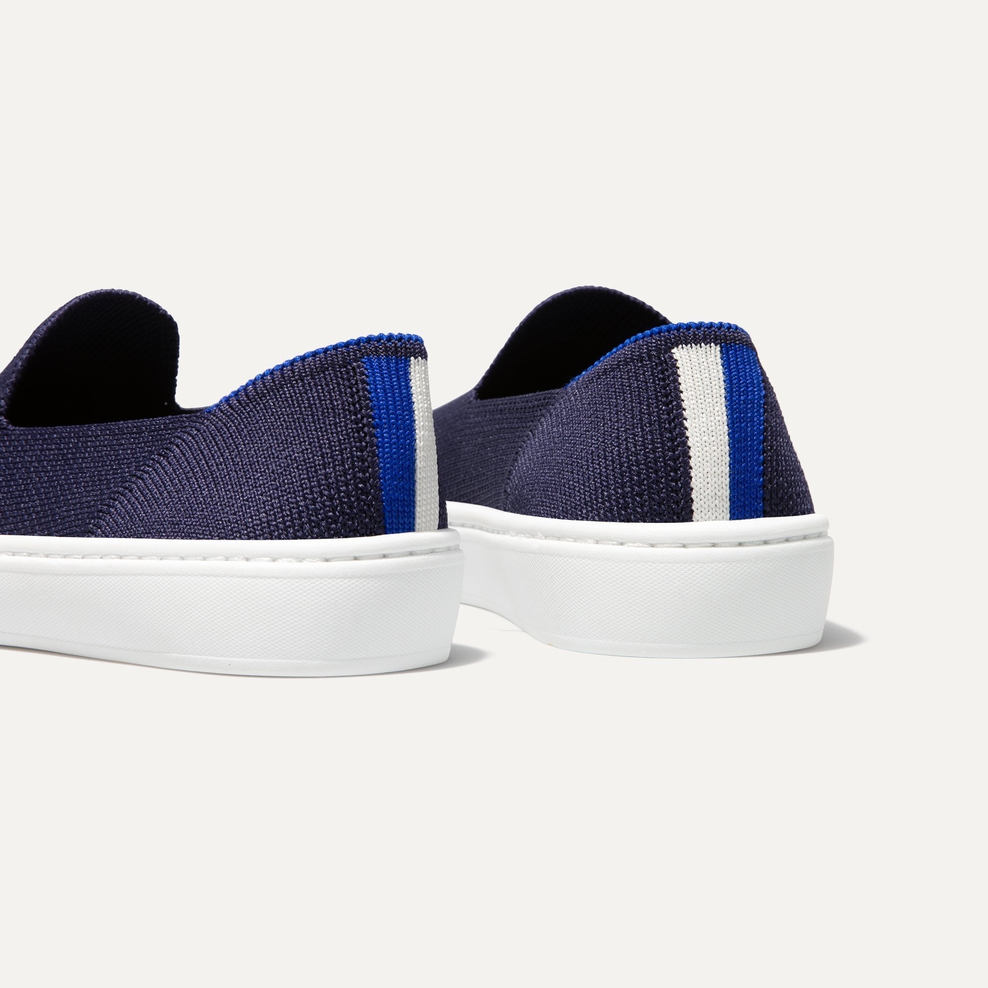 Rothys Slip-On Sneaker in Navy The Original Slip On Sneaker in Black Solid | Rothy main image 3