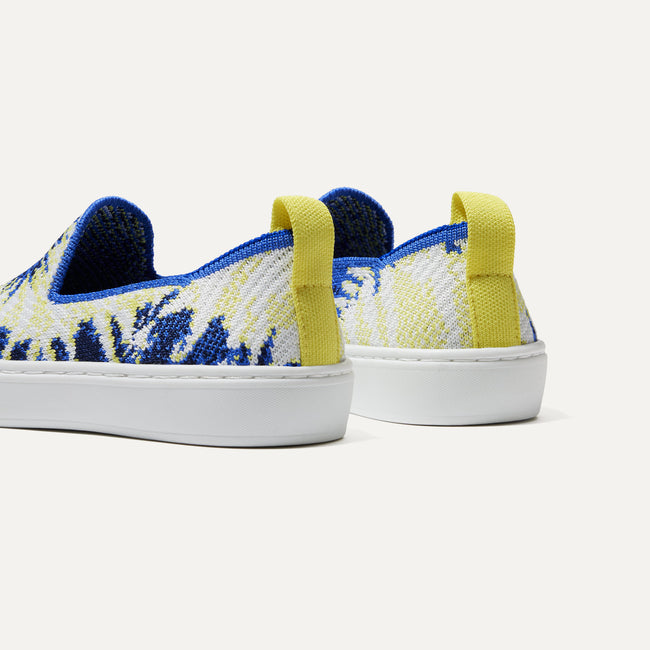 The Kids slip-on Sneaker in Blue Burst shown from the back view with the heel detail.