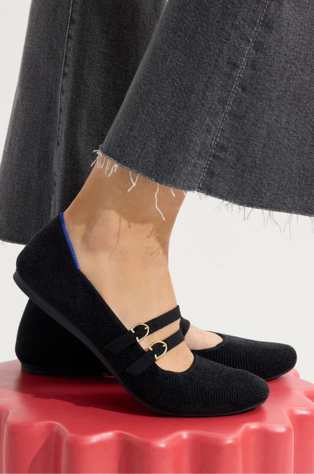 Close up shot of Model wearing The Double Buckle Mary Jane in Black.