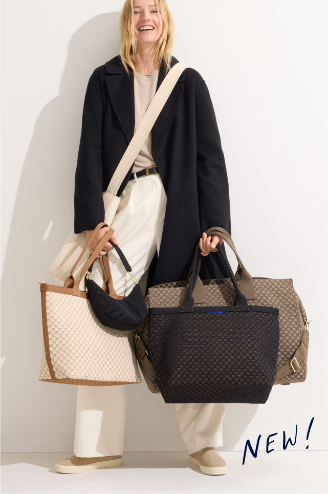 A woman presents two bags with a basketweave design, both marked "new," highlighting a chic accessory choice.