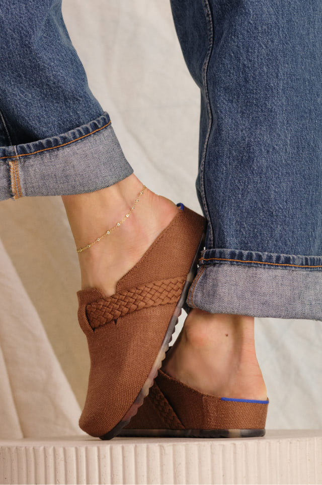 Close up shot of Model wearing The Braid Clog in Acorn.
