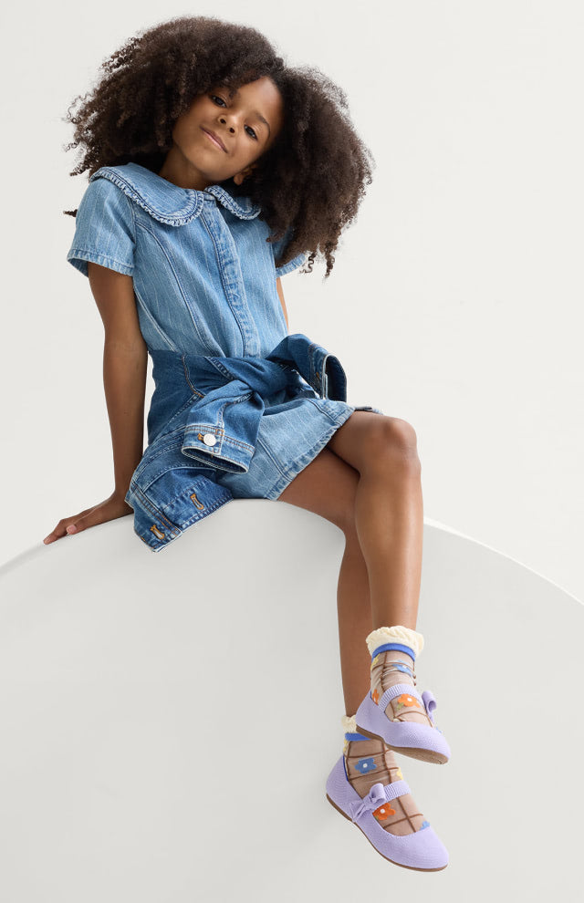 Child wearing The Kids Tux Bow Mary Jane in Soft Orchid.