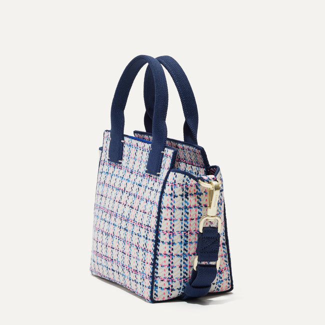 The Mini Handbag in Primrose Tweed shown in diagonal view.