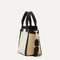 The Mini Handbag in Piano Keys shown in diagonal view.