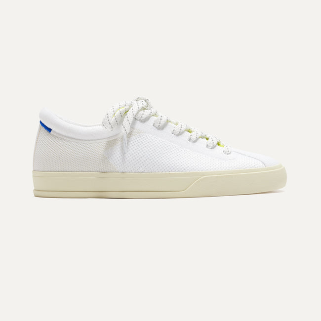 The Lace Up Sneaker in Chartreuse shown from the side. 