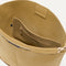 The Bucket Bag in Golden Wheat close up of interior zipper pocket.