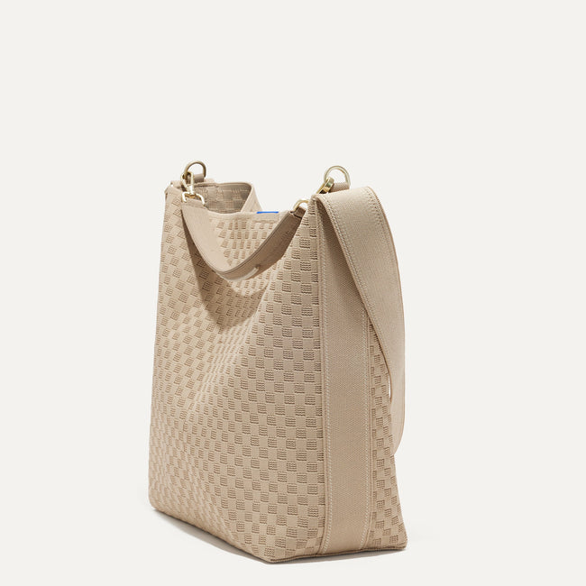 The Bucket Bag in Knot Brown shown in a diagonal view.