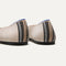 The Square toe flat shoe in Tuxedo shown from the back view with the heel detail. 