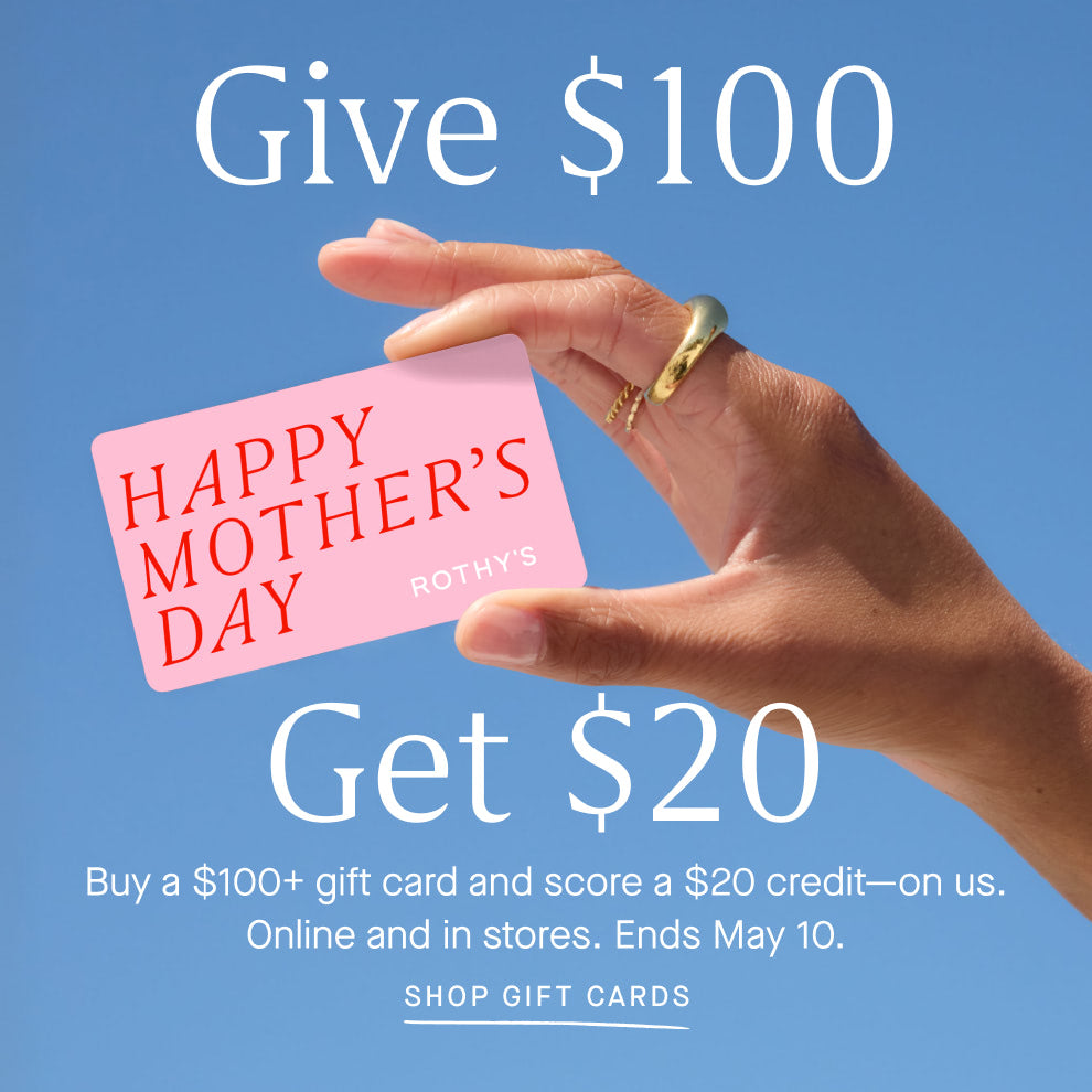 Image of a hand holding a gift card with copy overlay reading "Give $100 Get $20 | Make mom's day (and yours). Buy a $100+ gift card and score a $20 credit--on us. | SHOP GIFT CARDS"