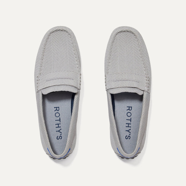 A pair of The Driving Loafer in Light Grey Herringbone shown from the top. 