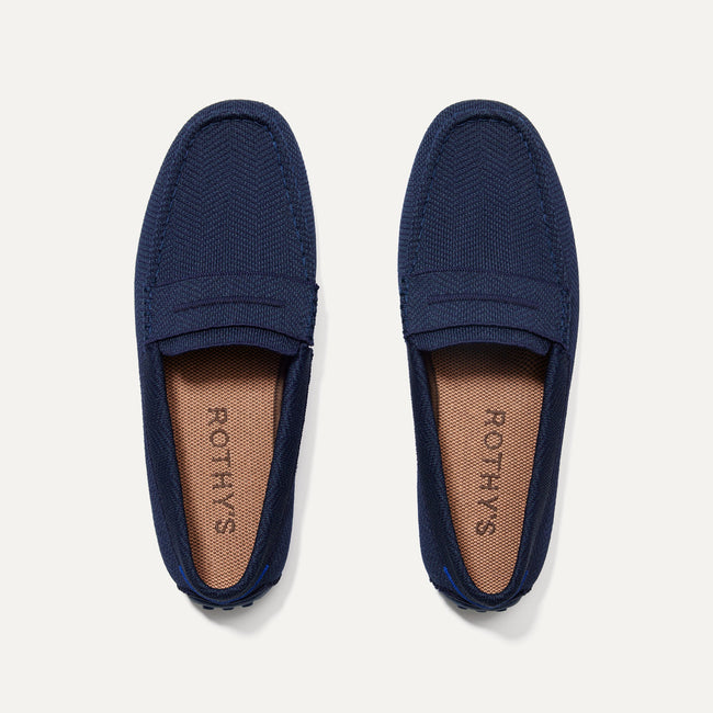 A pair of The Driving Loafer in Navy Herringbone shown from the top. 