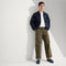 Alternate view of a model wearing The Driving Loafer in Navy. 
