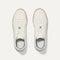 A pair of The RS01 Sneaker in Bone shown from the top.
