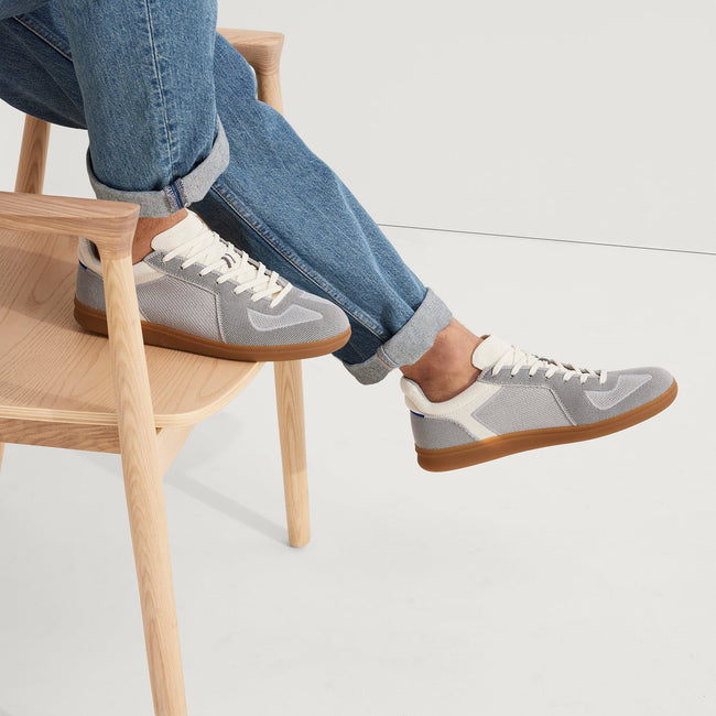 hover | Model wearing The RS01 Sneaker in Ash Grey.