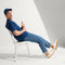 model | Alternate view of a model wearing The RS01 Sneaker in Bone.