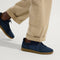 hover | Model wearing The RS01 Sneaker in Navy.