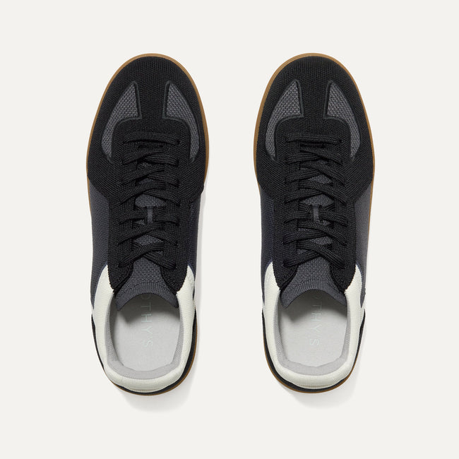 A pair of The RS01 Sneaker in Obsidian Black shown from the top.