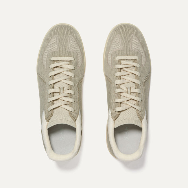 A pair of The RS01 Sneaker in Palm Grey shown from the top. 
