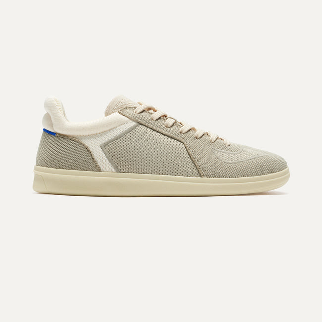 The RS01 Sneaker in Palm Grey shown from the side. 
