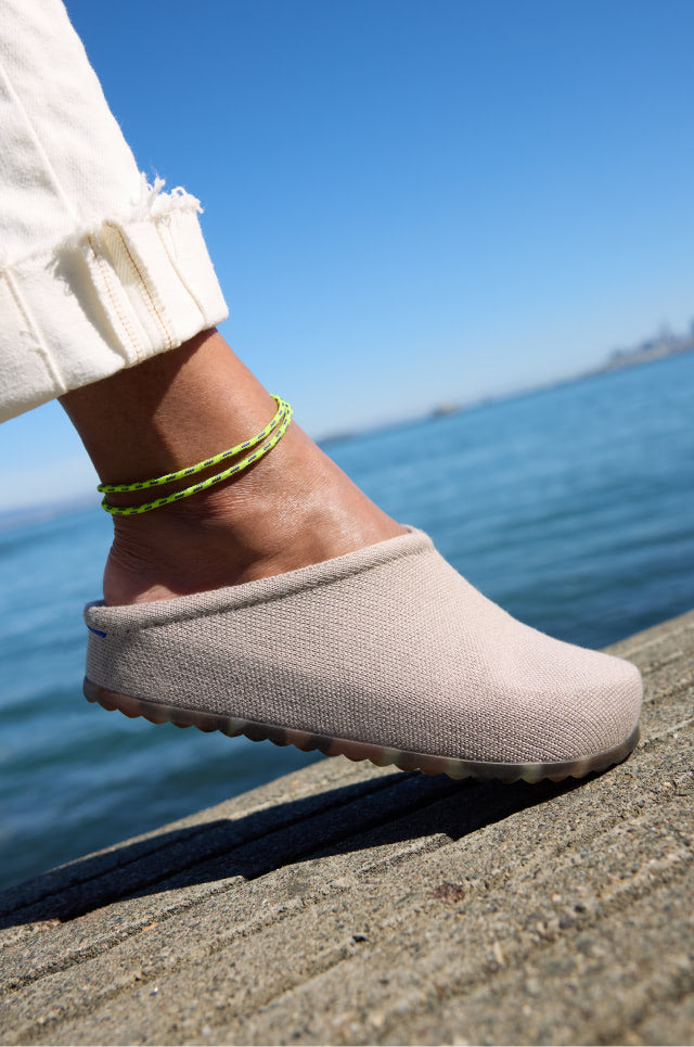 Close up of person wearing The Casual Clog in Dove.