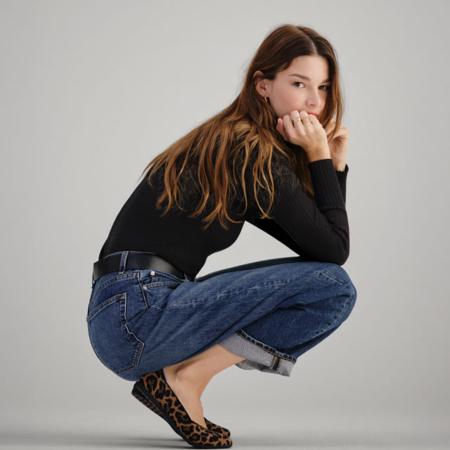 Model wearing The Daily Flat in Sable Spot.