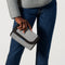hover | Model wearing The Belt Bag in Grey Mist.