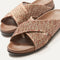 Close up of the crossing knit straps and toe of The Weekend Slide in Revive Mélange, shown in diagonal view. 