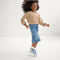 Alternate view of a model wearing The Kids Strap Sneaker in Berry Blue. 