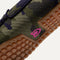 Close up of the raised nub outsoles of The Driver in Spruce Camo. 
